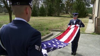 Honor Guard Team Demonstrate Proper Flag Folding Techniques