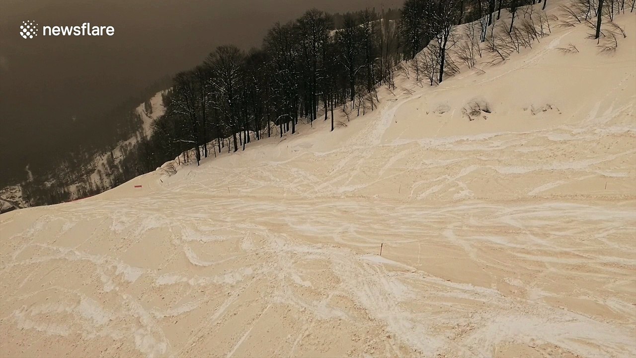 Sahara dust storm turns Sochi snow an eerie orange