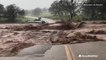 Road completely washed away by severe flash flooding