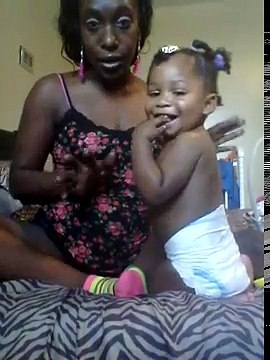 Breastfeeding while doing hair and being distred by older sibling