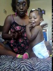 Breastfeeding while doing hair and being distred by older sibling