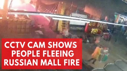 Descargar video: CCTV shows people fleeing deadly Russian mall fire