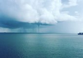 Dramatic Gulf Waterspout Spins Over Still Waters