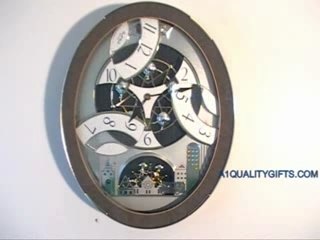 Tri-Cracker Motion Clock  Rhythm Small World Motion Clock