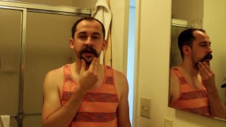 Shaving with a Handlebar Mustache