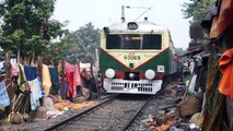 Kolkata - Shantytown along active rail tracks