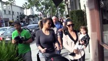 Kim Kardashian Walks Into A Paparazzi Frenzy [2013]