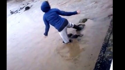 Girl gets stuck in mud ! Hilarious !
