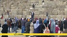 World's tallest man and smallest woman visit Egypt's famous pyramids