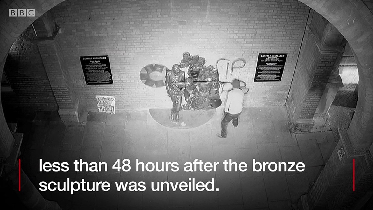 The vandal spent about two minutes spraying the artwork, wall and pavement