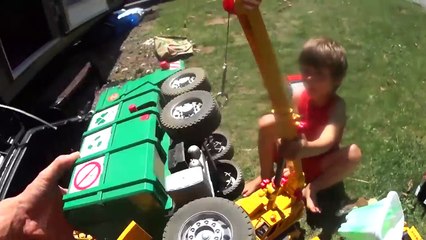 Excavator Loading Dump Truck At Night