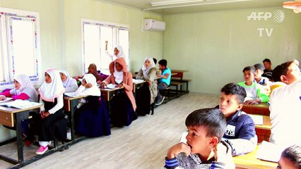 Iraqi Roma village school reopens after 14 years