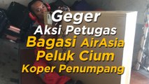 Geger Aksi Petugas Bagasi AirAsia Peluk Cium Koper