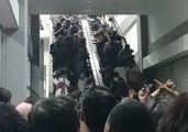 Jakarta Commuters Rush Up Escalator Travelling Downwards