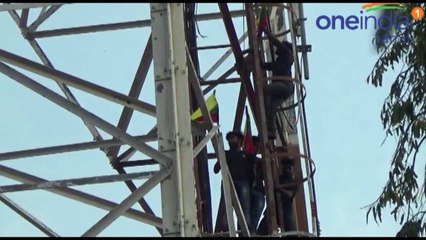 டவரில் ஏறி போராட்டம்...சிவகங்கையில் பரபரப்பு- வீடியோ