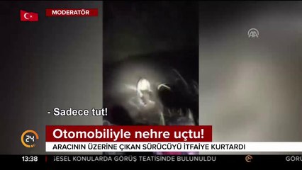 Nehre düşen otomobilinin üzerinde kurtarılmayı bekledi