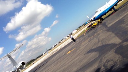 A Learjet 60 taxiing to the active runway at KFXE.