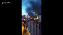 Firefighters on scene of fire near London's Olympic Park