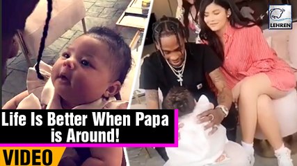 Kylie Jenner BF Travis Scott Lovingly Cradles Baby Stormi At Family Easter Party