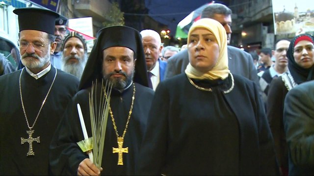 Israel-Gaza violence: Christians and Muslims attend vigil