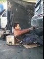 Chinese man repairing car - funny videos