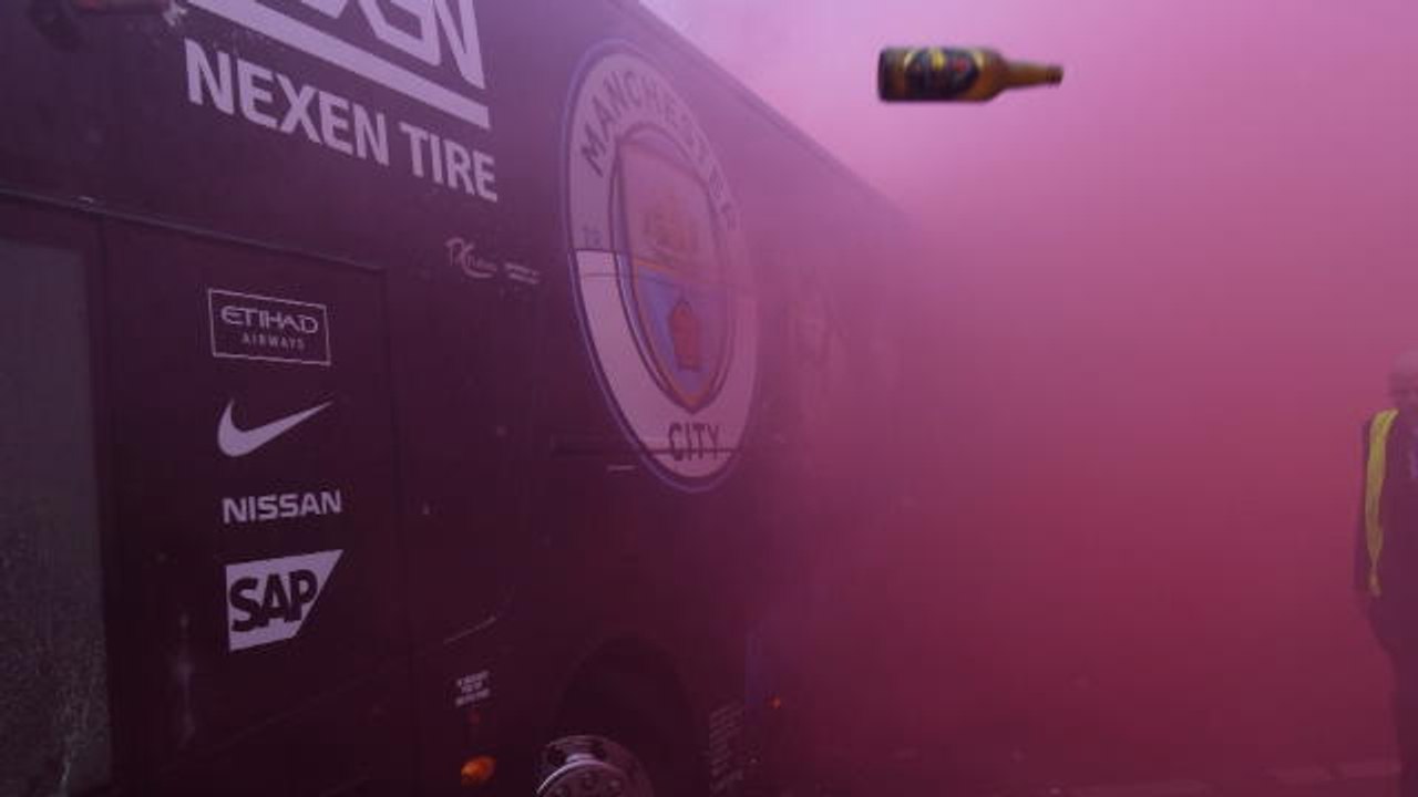 Guardiola criticises security after City bus is attacked by Liverpool fans