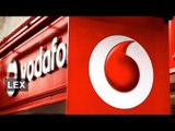 Vodafone invests for upturn