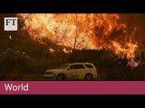 Hundreds of thousands flee as fires rage around LA