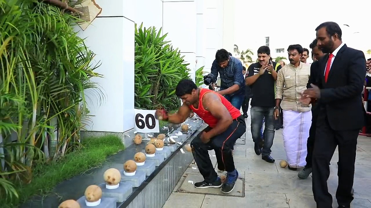 Most coconuts smashed in a minute! - Guinness World Records