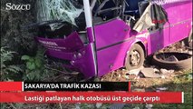 Lastiği patlayan halk otobüsü üst geçide çarptı