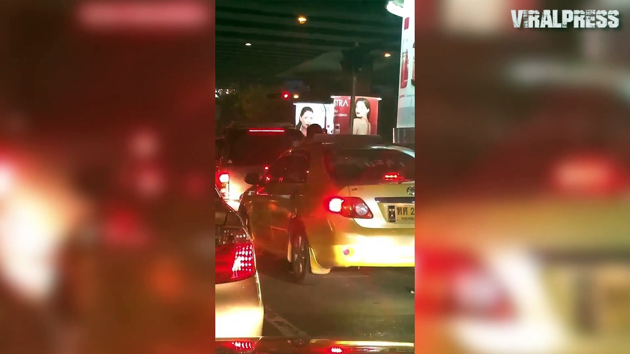 Angry Wife Climbs On Husband's Moving Taxi