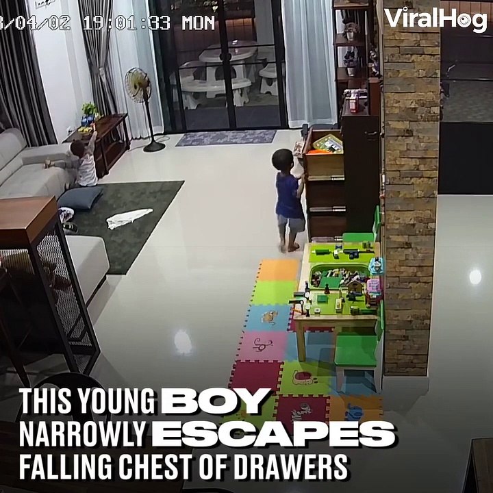 This kid escaped the worst, almost crushed by a cabinet