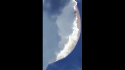 A strange phenomenon causes hysteria among Indonesian students who claim to see a giant UFO in the clouds or a strange effect in the clouds