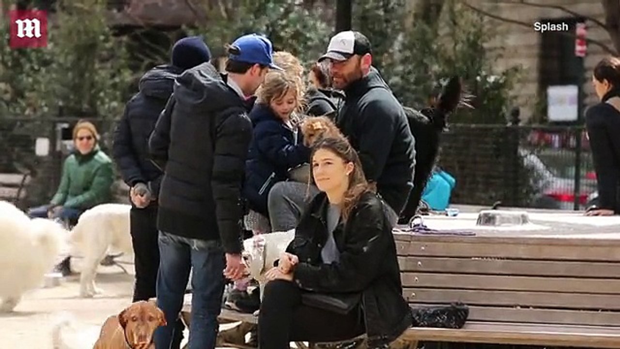 Liev Schreiber and his girlfriend Taylor Neisen take their dogs to Washington Square Park in New York City