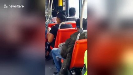 Woman is filmed dying hair on bus