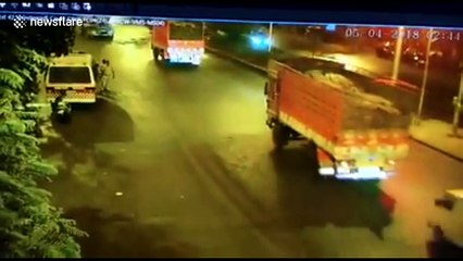 Sparks fly as bike skids on road at high speed