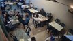 Diners use chairs and glasses as weapons in shocking restaurant brawl
