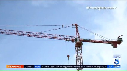 Man in Custody After Ascending 200-Foot Crane in Hollywood While Wrapped in American Flag