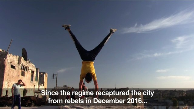 Youths bring parkour to Syria's war-battered east Aleppo