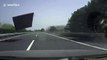Dash-cam video captures moment flying iron plank smashes windscreen