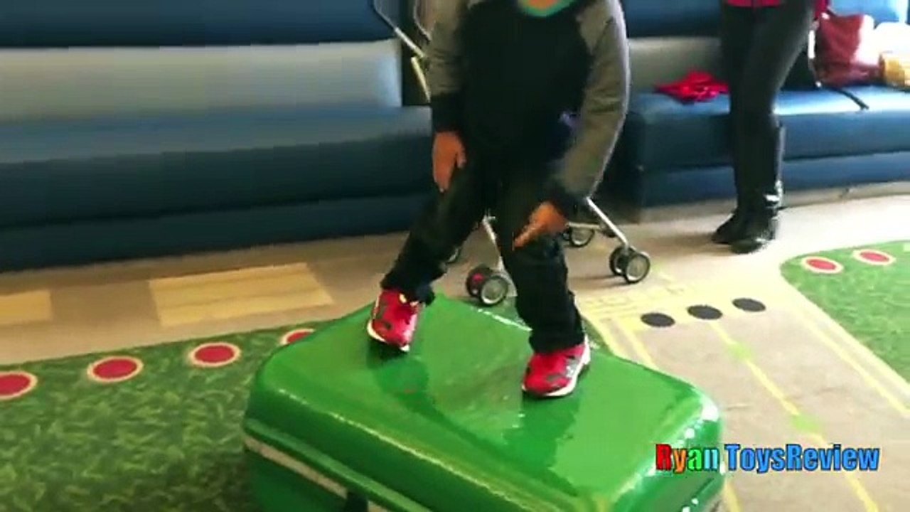 Ryan on the Airplane going to DisneyLand and open toys surprise eggs