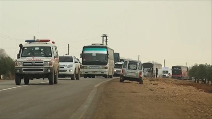 حافلات تقل مسلحين وأهالي دوما تصل ريف حلب