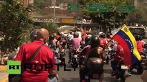 Venezolanos rinden homenaje a Hugo Chávez en una multitudinaria marcha en moto en Caracas