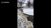 Watch huge sheets of ice break off of the Big Sioux River