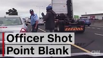 Cop shot point blank in the back