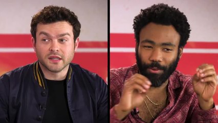 Solo's Alden Ehrenreich and Donald Glover Talk Han, Lando, and Capes, Plus Prop Masters Regal Robot!