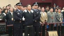 Chinese official pleads guilty to corruption, abuse of power