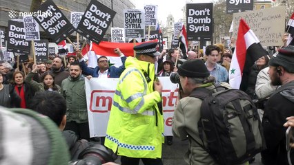 Scores protest outside Downing Street against air strikes in Syria