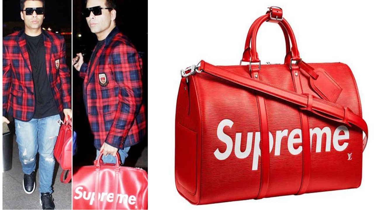 Karan Johar spotted with bold Red Bag, showcased his edgy airport look | FilmiBeat