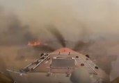 Pilot Drops Fire Retardant on Texas Wildfire